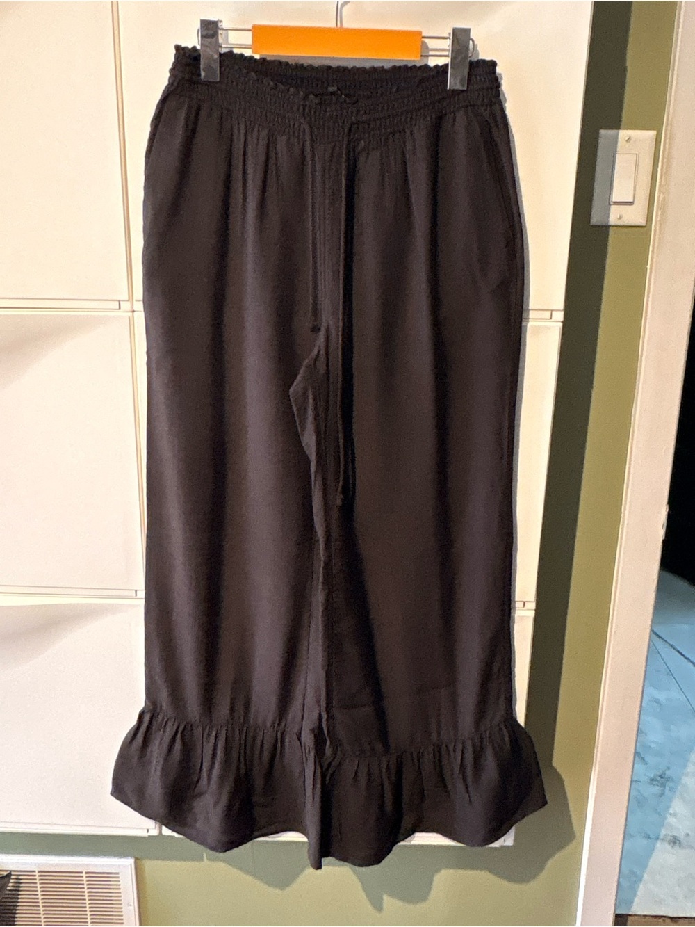 Divided Black Wide-Leg Pants with Ruffle Hem